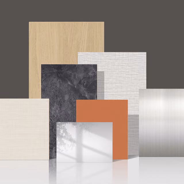Carbon Rock Board finish samples fanned out across wood, stone, metal and solid colours