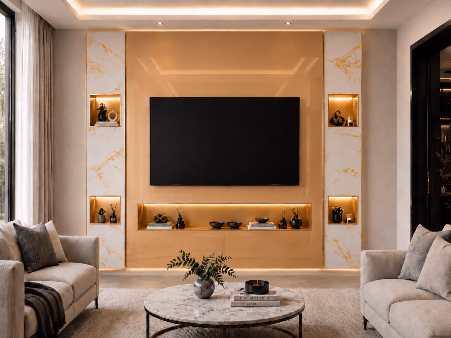 Gold media wall flanked by white marble display columns